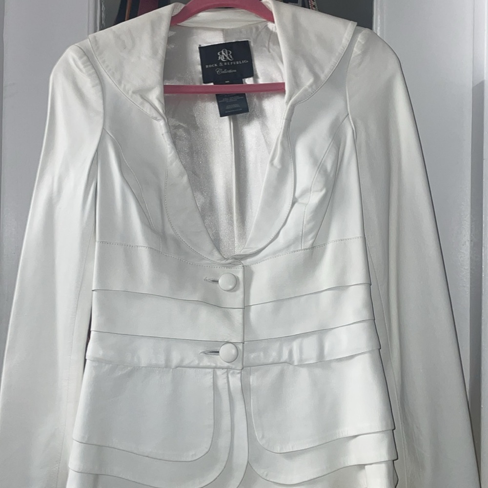 A vintage, white leather, supple Rock & Republic Collection.Shell is polyester.